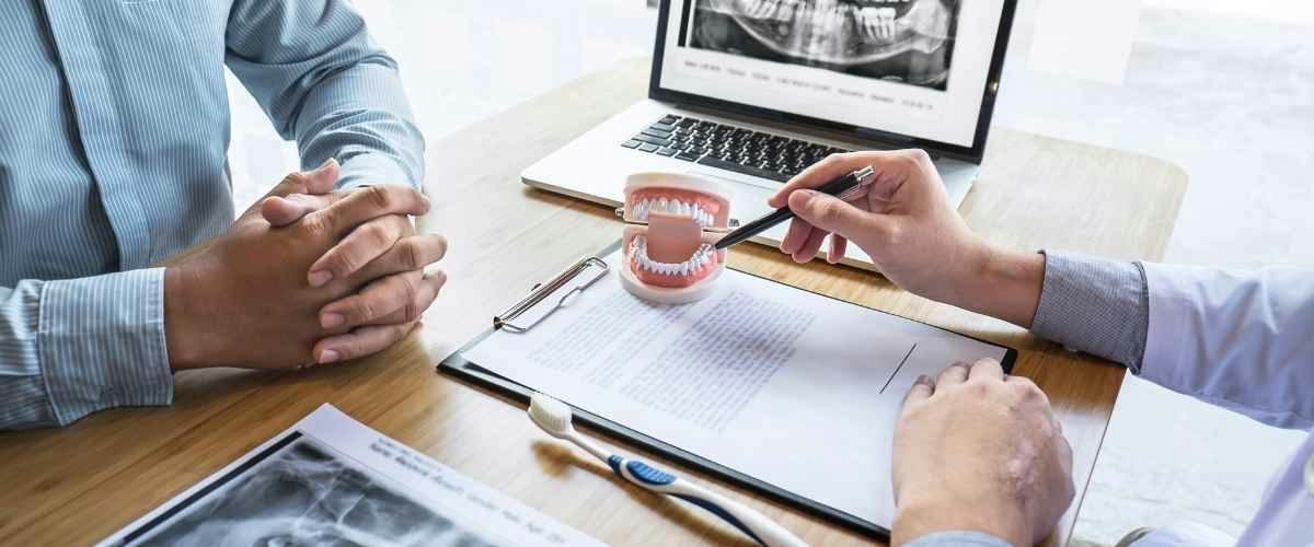 Patient learning about gum grafting timing after gum disease treatment at Bamboo Dental in Richmond Hill
