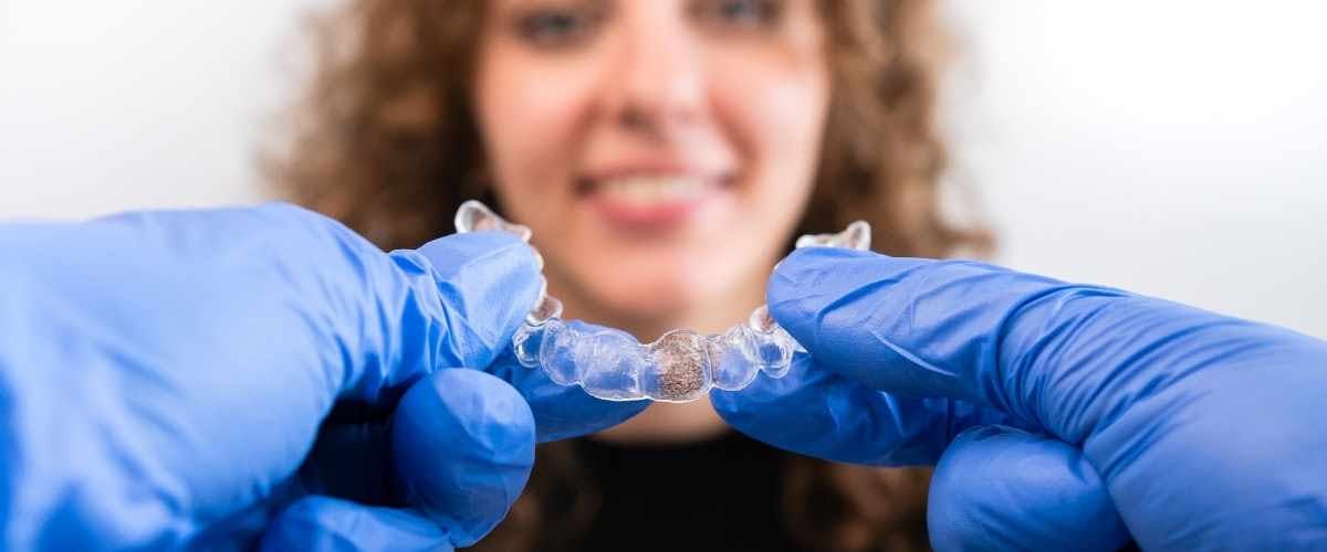 Patient reviewing Invisalign treatment plan with orthodontist